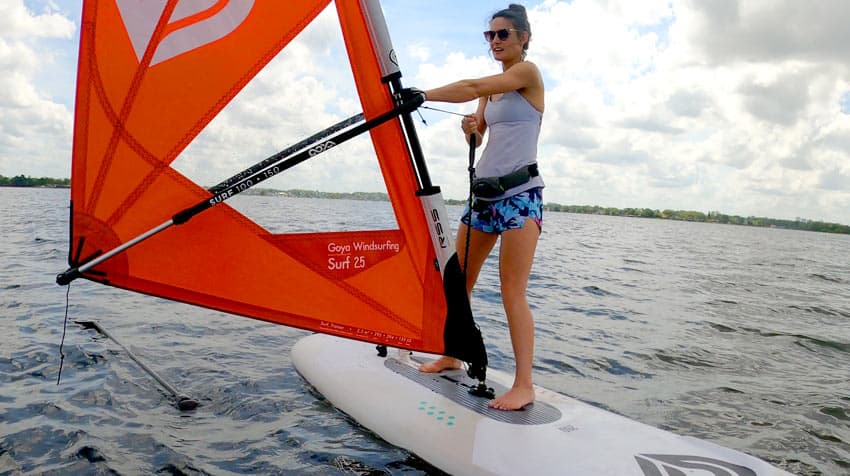 Windsurfer in action with colorful sail on Lake Fairview